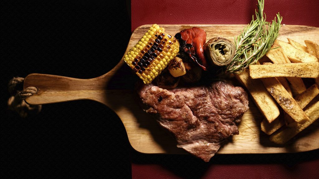 Rustic fire-grilled steak served at Altamira Spanish restaurant in Valletta, Malta